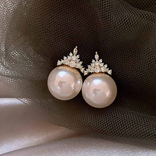 Zircon Crown Pearl Stud Earrings Retro $18.38 Dana Fashion Color: Crown Pearl Earrings Women's Accessories Product information: Treatment Process: inlaid zircon Color: Crown pearl earrings Applicable population: Female Material: Copper Shape: Flower Packi
