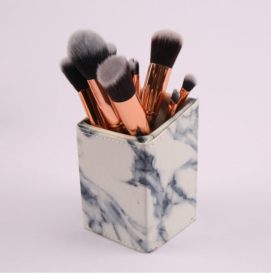 10 marble makeup brush sets, beauty tools, blush, eye shadow, face modification, 5 big 5 small explosions. $17.00 Dana Fashion Color: Black style: Square tube makeup Set of brush count: 10 Brush material: rayon Brush type: PU Handle material: plastic Hand
