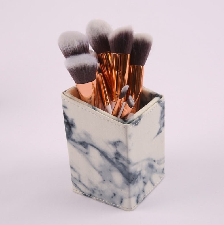 10 marble makeup brush sets, beauty tools, blush, eye shadow, face modification, 5 big 5 small explosions. $17.00 Dana Fashion Color: White style: Square tube makeup Set of brush count: 10 Brush material: rayon Brush type: PU Handle material: plastic Hand