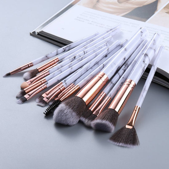 15 Marbled Design Makeup Brushes Set $21.17 Dana Fashion Color: Grey quantity: Q15pcs makeup Overview: 1. This set includes3 unique brushes to help create an array of different looks. 2. Different shapes and sizes of the bristles allow you to create a var