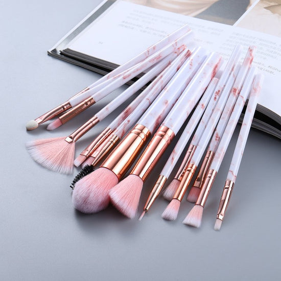15 Marbled Design Makeup Brushes Set $21.17 Dana Fashion Color: Pink quantity: Q15pcs makeup Overview: 1. This set includes3 unique brushes to help create an array of different looks. 2. Different shapes and sizes of the bristles allow you to create a var