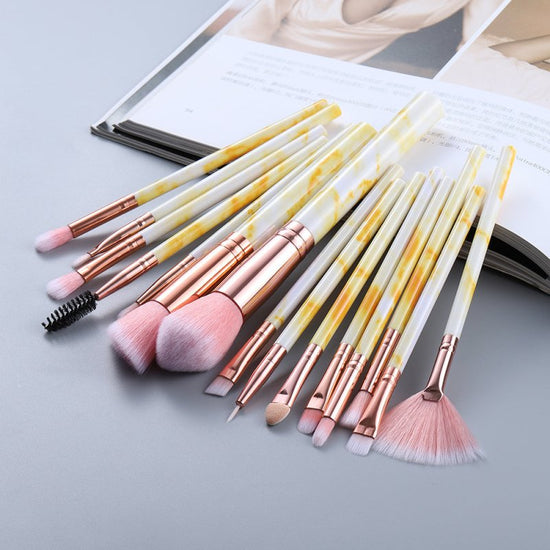 15 Marbled Design Makeup Brushes Set $21.17 Dana Fashion Color: Yellow quantity: Q15pcs makeup Overview: 1. This set includes3 unique brushes to help create an array of different looks. 2. Different shapes and sizes of the bristles allow you to create a v