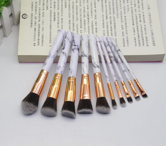 15 Marbled Design Makeup Brushes Set $17.52 Dana Fashion Color: White quantity: Q10pcs makeup Overview: 1. This set includes3 unique brushes to help create an array of different looks. 2. Different shapes and sizes of the bristles allow you to create a va
