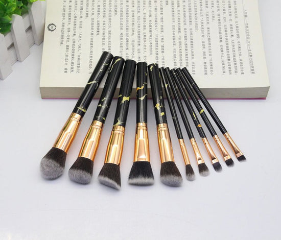 15 Marbled Design Makeup Brushes Set $17.17 Dana Fashion Color: Black quantity: Q10pcs makeup Overview: 1. This set includes3 unique brushes to help create an array of different looks. 2. Different shapes and sizes of the bristles allow you to create a va