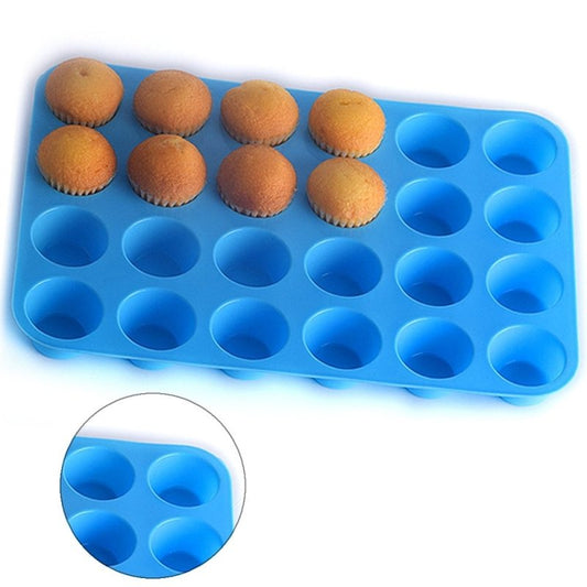 24 holes with round silicone cake mould $13.50 Dana Fashion Color: Blue Size: 33X22cm Dana's Kitchen Material: Silicone Type: Muffin Cupcake Pan Size: 22 * 33cm