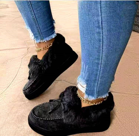 Hand-stitched shoes and snow boots