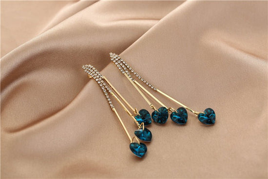 925 Silver Long Diamond-studded Tassel Earrings $17.80 Dana Fashion Color: E16404 Women's Accessories Product information: Treatment Process: Electroplating Color: E16404 Material: Alloy Shape: heart shape Popular elements: love Style: Korean style Packin