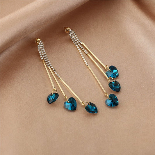 925 Silver Long Diamond-studded Tassel Earrings $17.80 Dana Fashion Color: E16404 Women's Accessories Product information: Treatment Process: Electroplating Color: E16404 Material: Alloy Shape: heart shape Popular elements: love Style: Korean style Packin