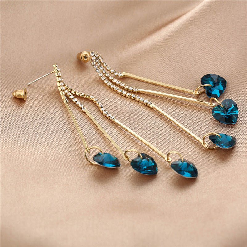 925 Silver Long Diamond-studded Tassel Earrings $17.80 Dana Fashion Color: E16404 Women's Accessories Product information: Treatment Process: Electroplating Color: E16404 Material: Alloy Shape: heart shape Popular elements: love Style: Korean style Packin