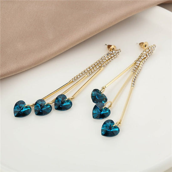 925 Silver Long Diamond-studded Tassel Earrings $17.80 Dana Fashion Color: E16404 Women's Accessories Product information: Treatment Process: Electroplating Color: E16404 Material: Alloy Shape: heart shape Popular elements: love Style: Korean style Packin