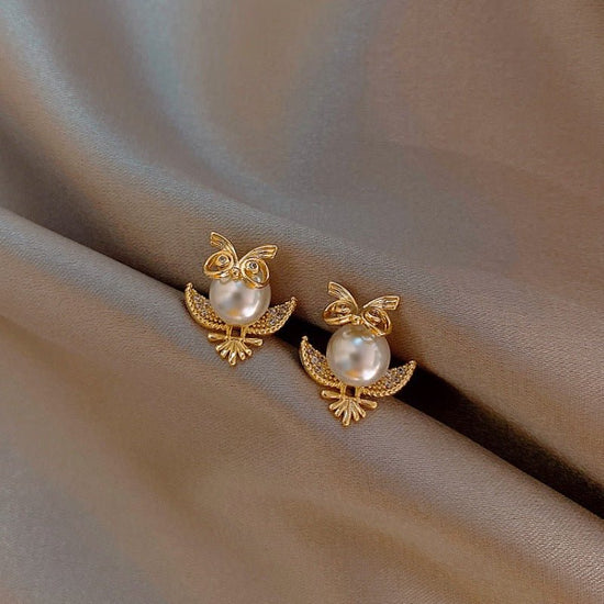 925 Silver Needle Smart French Light Tide Elegant Retro $6.55 Dana Fashion Color: Gold Women's Accessories Product information: Color: Owl stud earrings gold Applicable population: Female Material: Alloy Modeling: animal/Zodiac Popular elements: Owl Packi