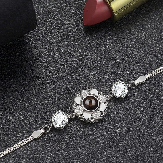 925 Silver Sunflower Projection Bracelet For Women $39.00 Dana Fashion Color: Rose Gold Women's Accessories Overview: 100% new design and high quality Must-have for fashion women Have a beautiful appearance Specifications: Material: Silver Style: Women's