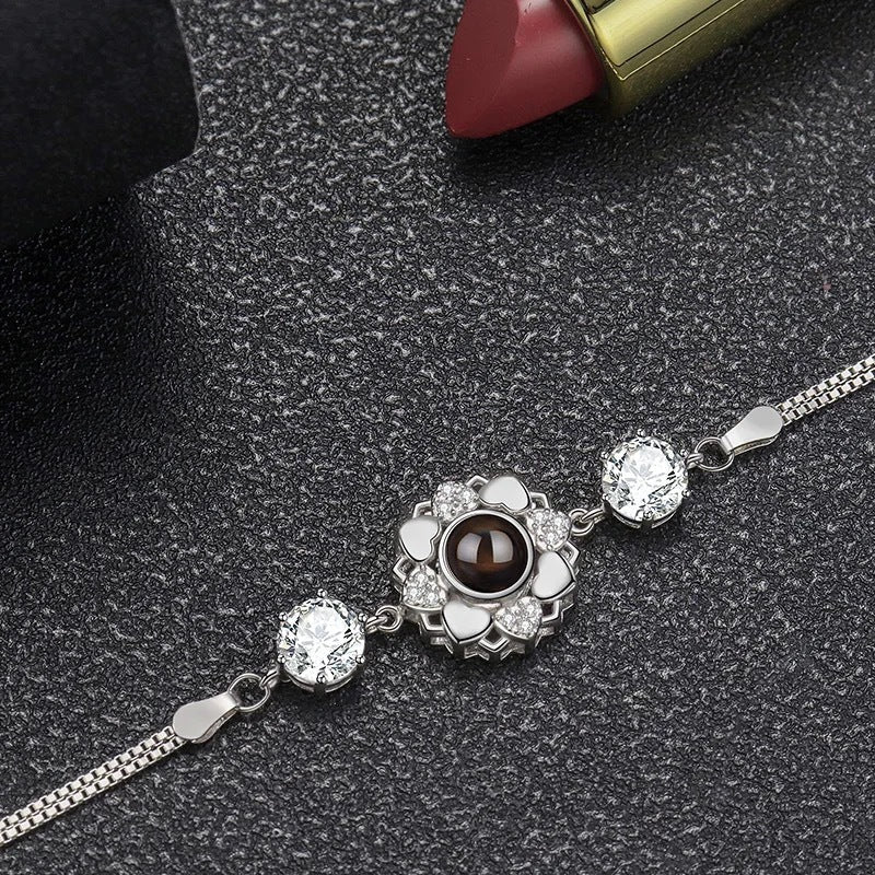 925 Silver Sunflower Projection Bracelet For Women $39.00 Dana Fashion Color: Rose Gold Women's Accessories Overview: 100% new design and high quality Must-have for fashion women Have a beautiful appearance Specifications: Material: Silver Style: Women's