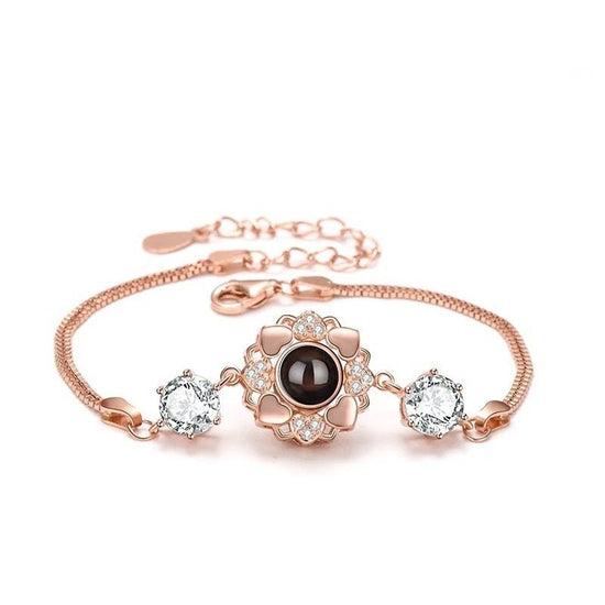 925 Silver Sunflower Projection Bracelet For Women $39.00 Dana Fashion Color: Rose Gold Women's Accessories Overview: 100% new design and high quality Must-have for fashion women Have a beautiful appearance Specifications: Material: Silver Style: Women's