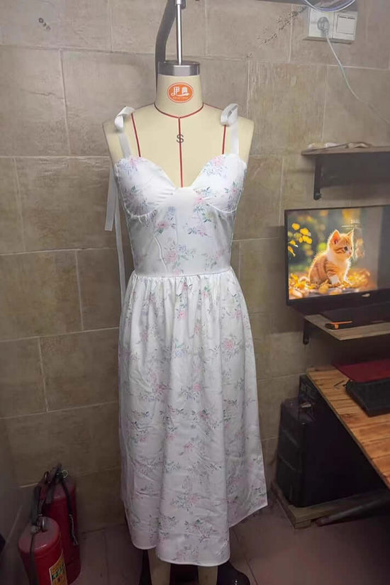 Women's Spring Clothing Elegant Low-cut Split Sling Dress $34.90 Dana Fashion Color: White Size: L Women's clothing Product information: Pattern: Printing Skirt type: suspender skirt Color: White Size: S,M,L,XL Style type: temperament commute Popular elem