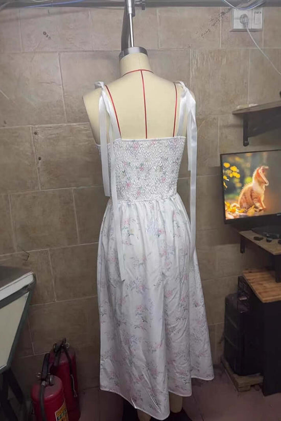 Women's Spring Clothing Elegant Low-cut Split Sling Dress $34.90 Dana Fashion Color: White Size: L Women's clothing Product information: Pattern: Printing Skirt type: suspender skirt Color: White Size: S,M,L,XL Style type: temperament commute Popular elem