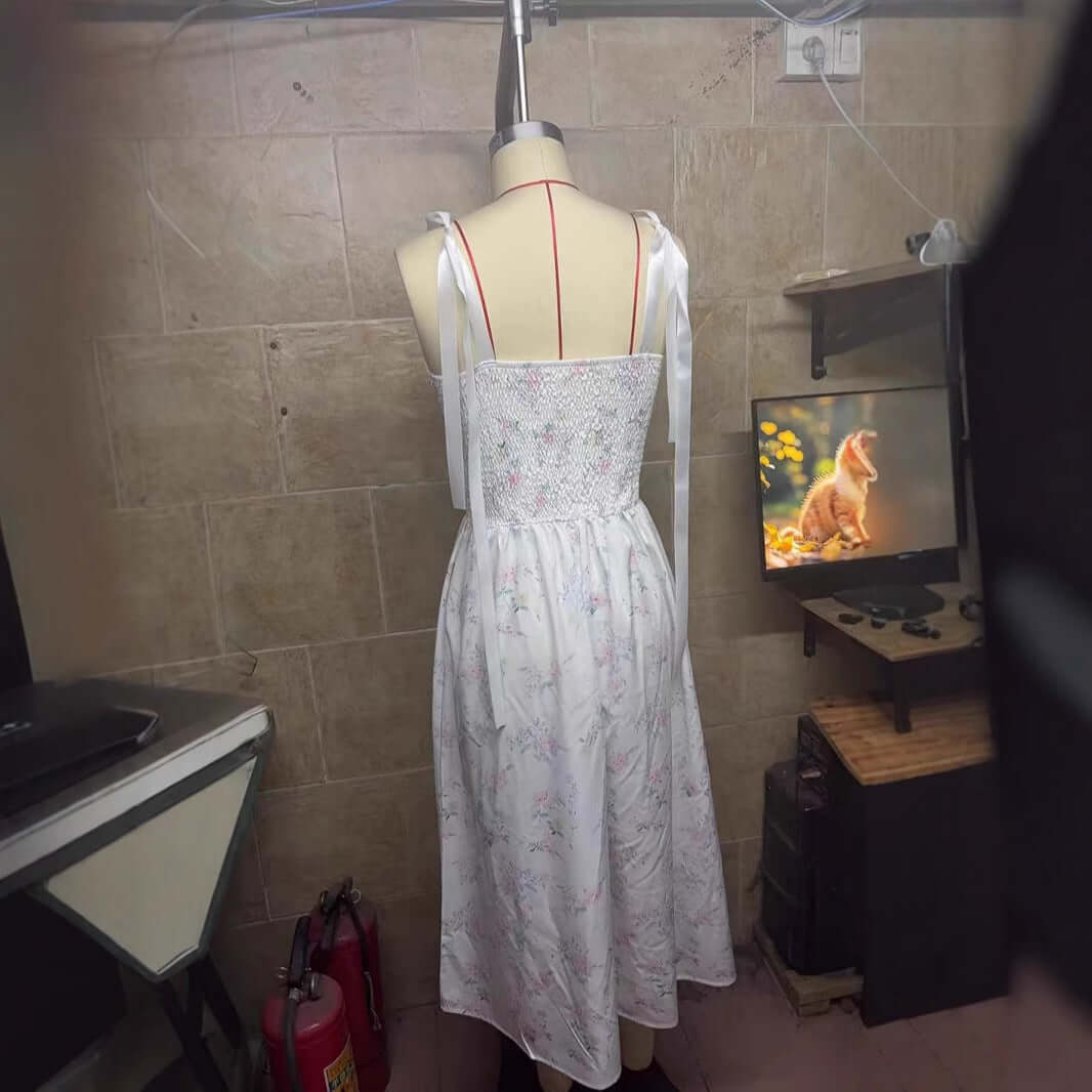 Women's Spring Clothing Elegant Low-cut Split Sling Dress $34.90 Dana Fashion Color: White Size: L Women's clothing Product information: Pattern: Printing Skirt type: suspender skirt Color: White Size: S,M,L,XL Style type: temperament commute Popular elem