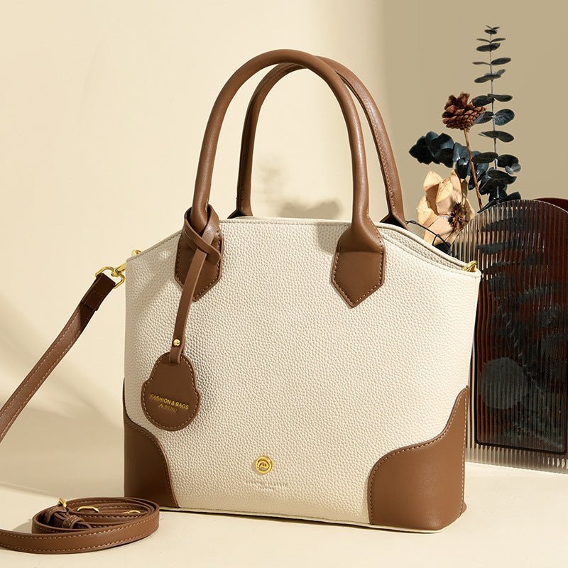A Versatile Retro Minimalist Crossbody Bag $65.00 Dana Fashion Color: Apricot With Brown Women's Bags Product information: Lining texture: Polyester Applicable scenarios: Daily matching Color: black with brown, milk tea with Brown, apricot with Brown, apr
