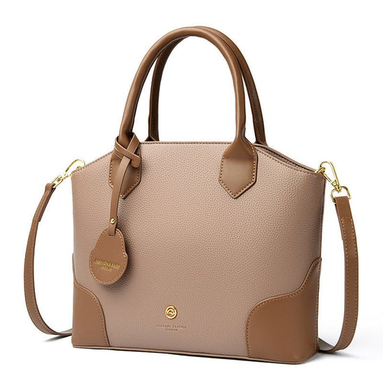 A Versatile Retro Minimalist Crossbody Bag $65.00 Dana Fashion Color: Milk Tea With Brown Women's Bags Product information: Lining texture: Polyester Applicable scenarios: Daily matching Color: black with brown, milk tea with Brown, apricot with Brown, ap