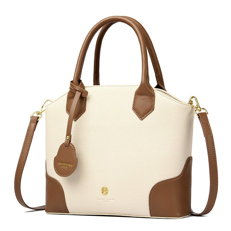 A Versatile Retro Minimalist Crossbody Bag $65.00 Dana Fashion Color: Apricot With Brown Women's Bags Product information: Lining texture: Polyester Applicable scenarios: Daily matching Color: black with brown, milk tea with Brown, apricot with Brown, apr