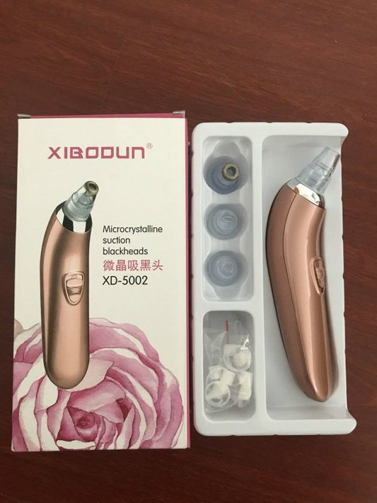 Acne remover household Pore Cleaner $39.99 Dana Fashion Color: Pink Size: Four heads Beauty Tools Product Name: microcrystalline black head instrument Products include: main engine, 4 suction heads, 1 manual, sealing ring, cleaning cotton Product model: x
