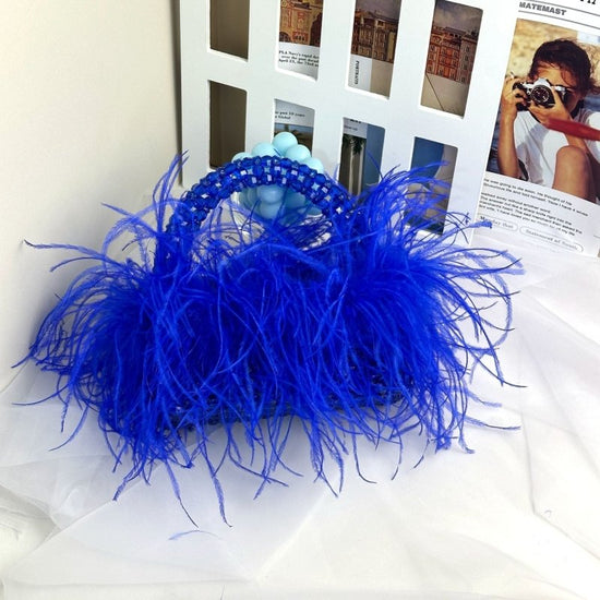 Acrylic Colored Ostrich Wool Beaded Handbag $140.90 Dana Fashion Color: Lake Blue Size: 19X11X8CM Women's Bags Product information: Applicable scenarios: Daily matching Color: Royal Blue, new Rose Red, Lake blue, red, orange, mint green, sauce purple, lem