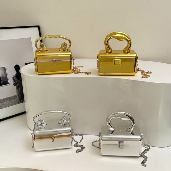 Acrylic Women's Fashion Shiny Surface Crossbody Bag $50.84 Dana Fashion Color: Style1 Gold Women's Bags Product information: Color: one gold, one silver, two gold, two silver Hardness: hard Material: acrylic Suitcase shape: Horizontal Square Popular eleme