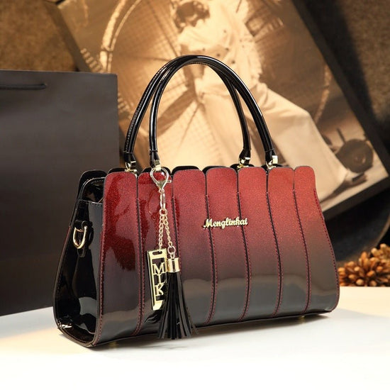 All-match handbag $180.99 Dana Fashion Color: Wine Red Women's Bags Leather material: patent leather Product size: 33cm* 13cm* 20cm Inside material: high-density polyester lining Product structure: zipper pocket / compartment inner pocket Style: single sh