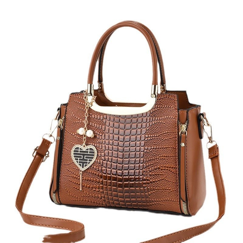 All-matching Crossbody Fashion Women's Large-capacity Shoulder Handbag $47.85 Dana Fashion Color: Khaki Size: Length 25 Width 12 Height 20 Women's Bags Product information: Lining texture: Nylon Applicable scenarios: Daily matching Color: black, white, re