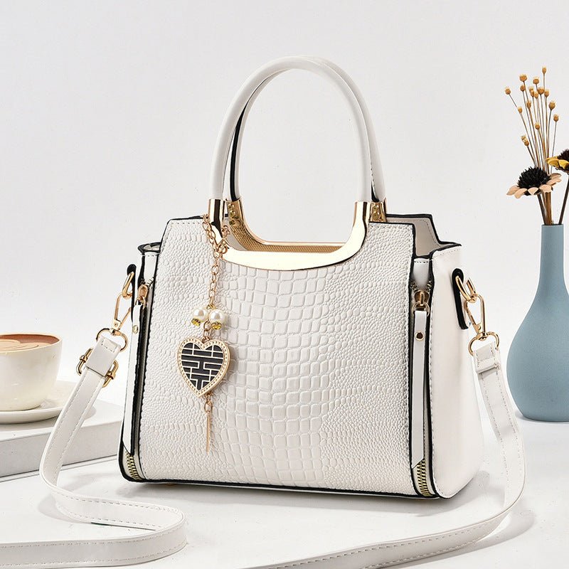 All-matching Crossbody Fashion Women's Large-capacity Shoulder Handbag $47.85 Dana Fashion Color: Black Size: Length 25 Width 12 Height 20 Women's Bags Product information: Lining texture: Nylon Applicable scenarios: Daily matching Color: black, white, re