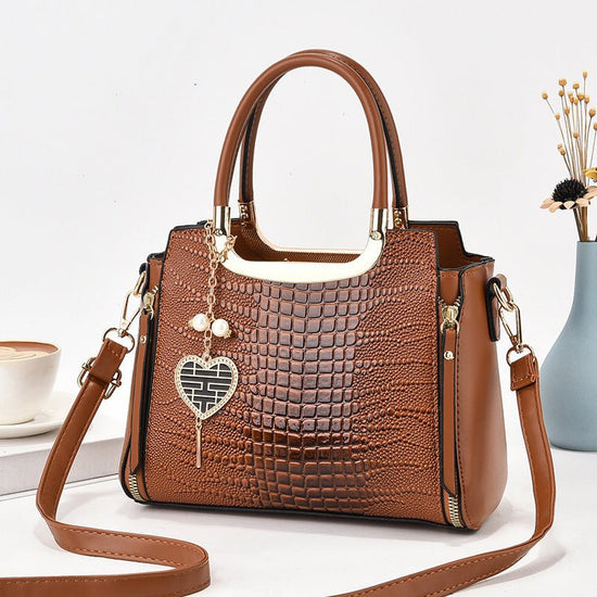 All-matching Crossbody Fashion Women's Large-capacity Shoulder Handbag $47.85 Dana Fashion Color: Black Size: Length 25 Width 12 Height 20 Women's Bags Product information: Lining texture: Nylon Applicable scenarios: Daily matching Color: black, white, re