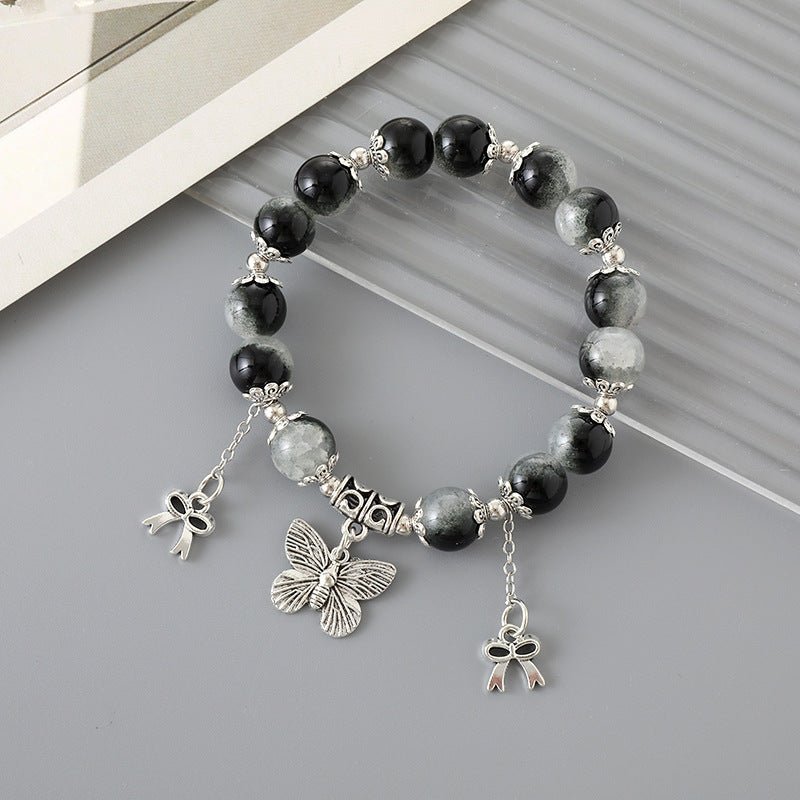All-matching Graceful Crystal Bracelet For Women $12.00 Dana Fashion Color: K3337 Black Women's Accessories Product information: Processing Technology: manual Color: K3334 butterfly crack bead bracelet pink, K3335 butterfly crack bead bracelet Blue, K3336