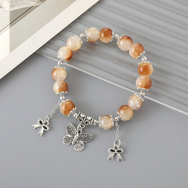All-matching Graceful Crystal Bracelet For Women $12.00 Dana Fashion Color: K3336 Brown Women's Accessories Product information: Processing Technology: manual Color: K3334 butterfly crack bead bracelet pink, K3335 butterfly crack bead bracelet Blue, K3336