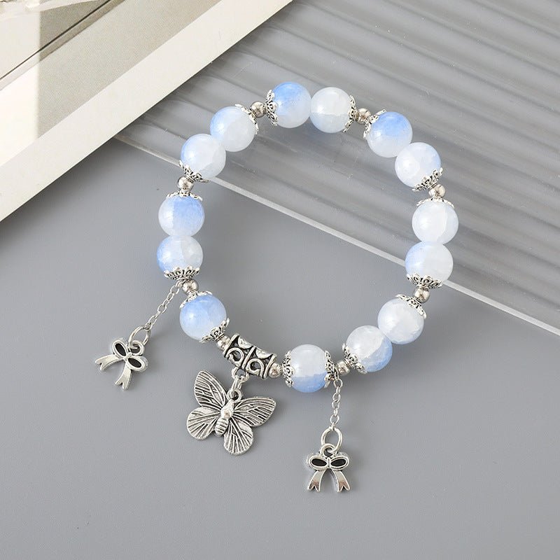 All-matching Graceful Crystal Bracelet For Women $12.00 Dana Fashion Color: K3335 Blue Women's Accessories Product information: Processing Technology: manual Color: K3334 butterfly crack bead bracelet pink, K3335 butterfly crack bead bracelet Blue, K3336