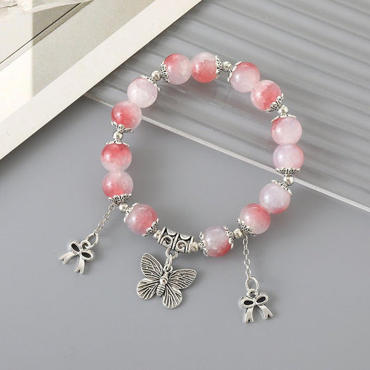 All-matching Graceful Crystal Bracelet For Women $12.00 Dana Fashion Color: K3334 Pink Women's Accessories Product information: Processing Technology: manual Color: K3334 butterfly crack bead bracelet pink, K3335 butterfly crack bead bracelet Blue, K3336