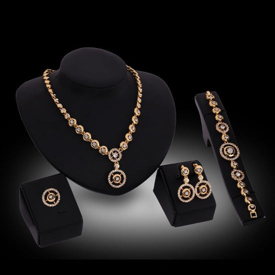 Alloy Rhinestone-encrusted Jewelry Four-piece Necklace $38.37 Dana Fashion Color: 18K Gold 61154169 Women's Accessories Product information: Pattern: Square Treatment Process: Diamond Color: 18K gold/61154169 Pendant material: artificial crystal Chain sty