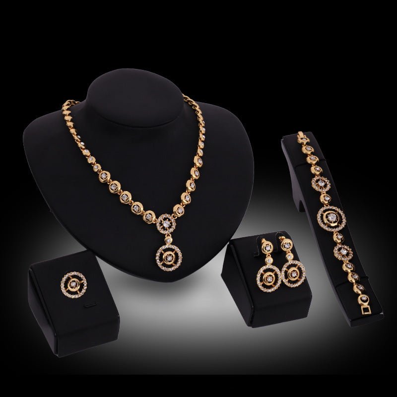 Alloy Rhinestone-encrusted Jewelry Four-piece Necklace $38.37 Dana Fashion Color: 18K Gold 61154169 Women's Accessories Product information: Pattern: Square Treatment Process: Diamond Color: 18K gold/61154169 Pendant material: artificial crystal Chain sty