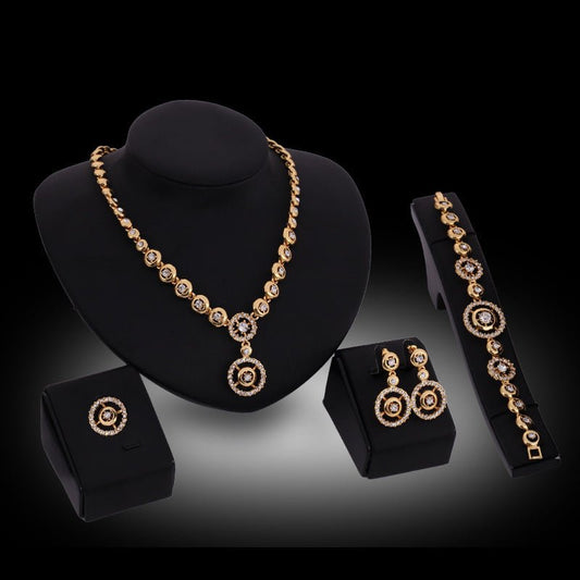 Alloy Rhinestone-encrusted Jewelry Four-piece Necklace $38.37 Dana Fashion Color: 18K Gold 61154169 Women's Accessories Product information: Pattern: Square Treatment Process: Diamond Color: 18K gold/61154169 Pendant material: artificial crystal Chain sty