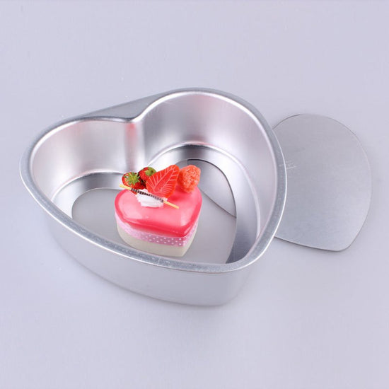 Aluminum Alloy Heart Shaped Live Bottom Cake Mould $34.09 Dana Fashion Color: 10inches Dana's Kitchen Product information: Shape: heart shape Material: aluminum alloy Application: cake mold Size Information: 3 inches - outer diameter 9CM*8CM, depth 2.8CM