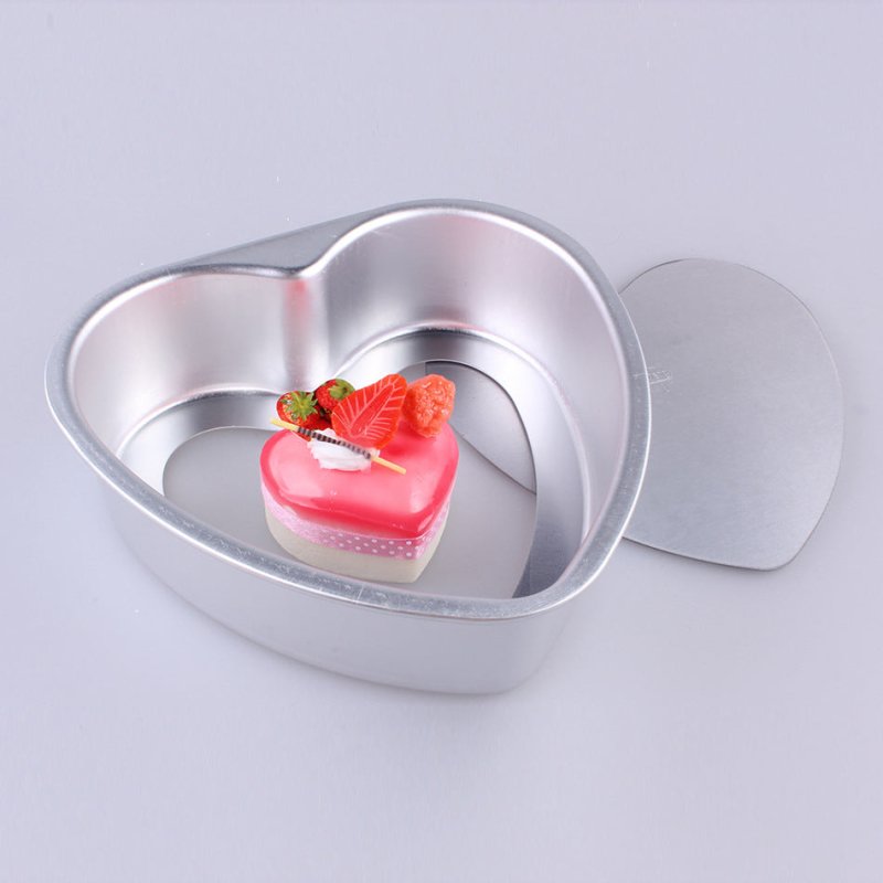 Aluminum Alloy Heart Shaped Live Bottom Cake Mould $34.09 Dana Fashion Color: 10inches Dana's Kitchen Product information: Shape: heart shape Material: aluminum alloy Application: cake mold Size Information: 3 inches - outer diameter 9CM*8CM, depth 2.8CM