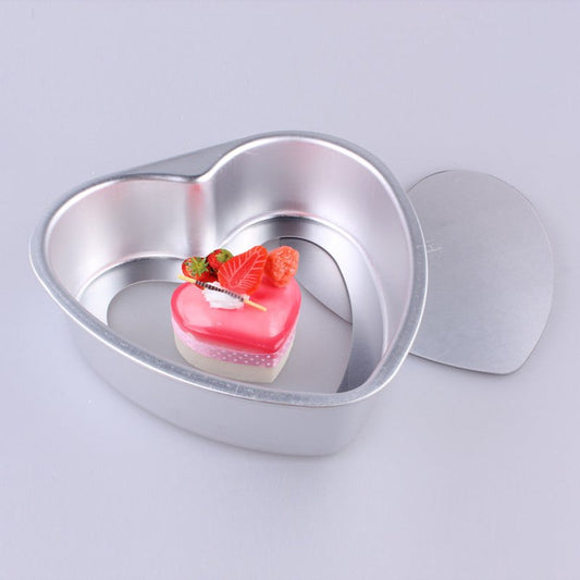 Aluminum Alloy Heart Shaped Live Bottom Cake Mould $34.09 Dana Fashion Color: 10inches Dana's Kitchen Product information: Shape: heart shape Material: aluminum alloy Application: cake mold Size Information: 3 inches - outer diameter 9CM*8CM, depth 2.8CM