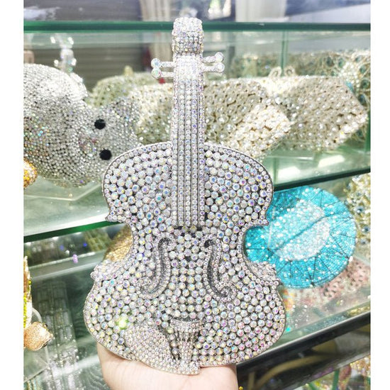 Amazing Luxury Violin Crystal Evening Bags Party Handbag $180.00 Dana Fashion style: AB silver Women's Bags Product information: Material: Alloy Closure: Magnetic buckle How to take the bag: hand, shoulder, messenger Applicable scene: banquet Luggage hard
