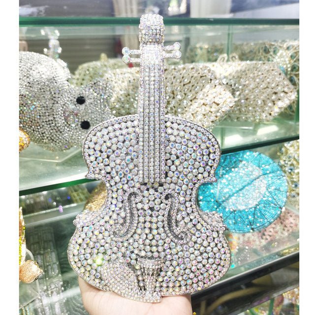Amazing Luxury Violin Crystal Evening Bags Party Handbag $180.00 Dana Fashion style: AB silver Women's Bags Product information: Material: Alloy Closure: Magnetic buckle How to take the bag: hand, shoulder, messenger Applicable scene: banquet Luggage hard