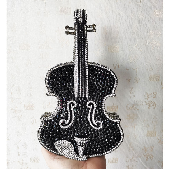 Amazing Luxury Violin Crystal Evening Bags Party Handbag $180.00 Dana Fashion style: C Women's Bags Product information: Material: Alloy Closure: Magnetic buckle How to take the bag: hand, shoulder, messenger Applicable scene: banquet Luggage hardness: ha