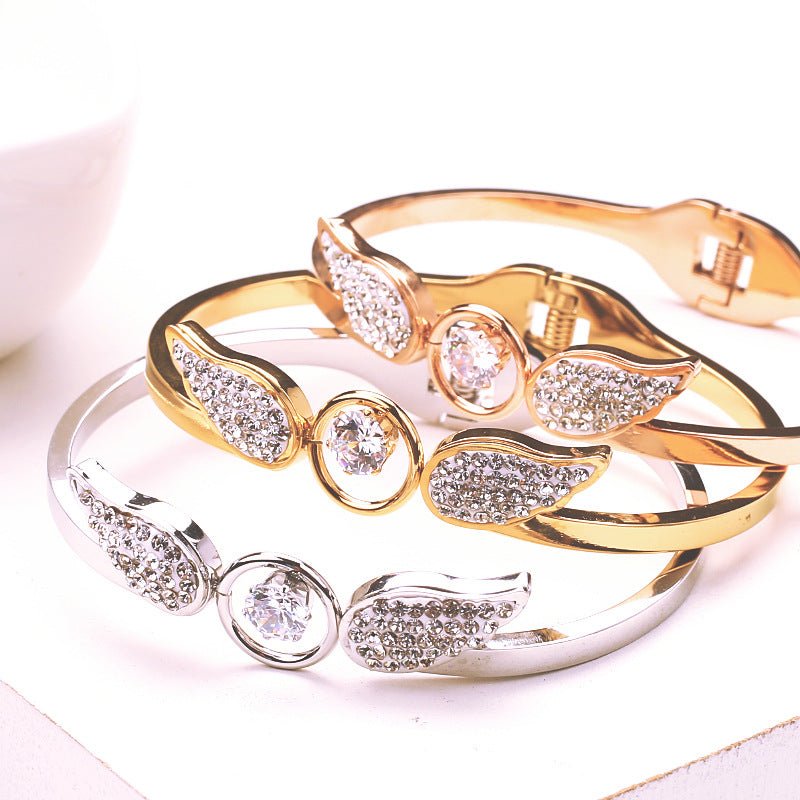 Angel Titanium Steel Hollow Bracelet Zircon Spring Opening $21.43 Dana Fashion Color: Gold Women's Accessories Product information: Treatment Process: zircon Color: silver, gold, rose gold Material: titanium steel Style: Simple Packing list: Bracelet x1 P