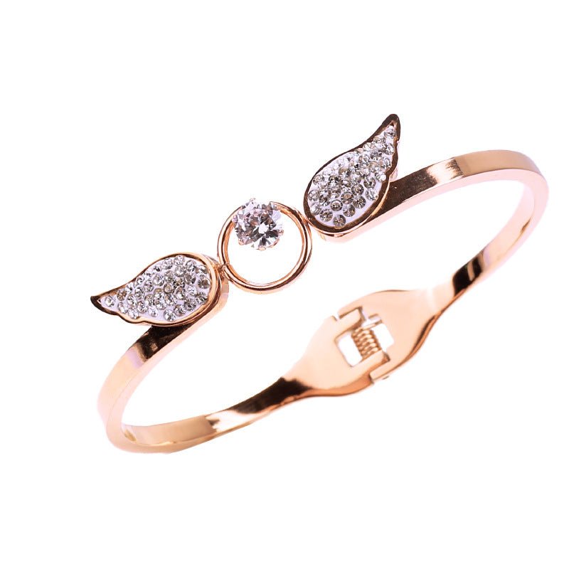 Angel Titanium Steel Hollow Bracelet Zircon Spring Opening $21.43 Dana Fashion Color: Gold Women's Accessories Product information: Treatment Process: zircon Color: silver, gold, rose gold Material: titanium steel Style: Simple Packing list: Bracelet x1 P