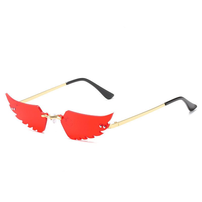 Angel wings sunglasses $19.23 Dana Fashion Color: Gold red Women's Accessories Commodity information: Glasses structure: frame Lens material: PC Style: Personality Frame material: metal UV resistance level: UV400 Model: Irregular feathers