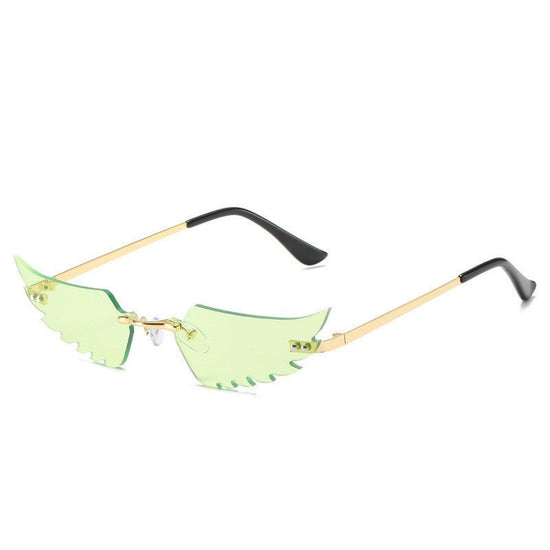 Angel wings sunglasses $19.23 Dana Fashion Color: Gold black Women's Accessories Commodity information: Glasses structure: frame Lens material: PC Style: Personality Frame material: metal UV resistance level: UV400 Model: Irregular feathers