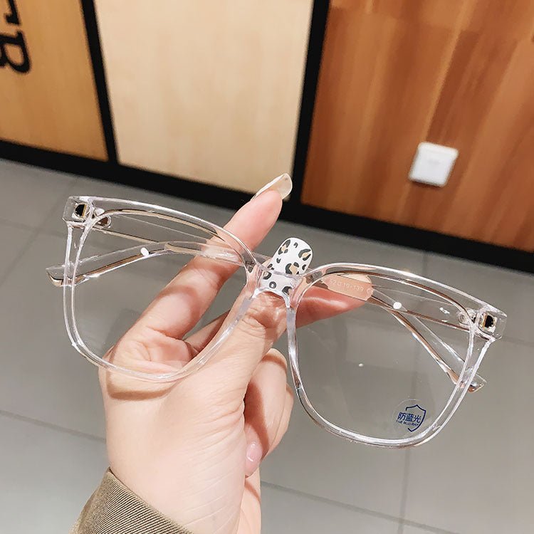 Anti-blue Light Myopia Glasses For Women $19.50 Dana Fashion Color: Transparent color Women's Accessories Product Details: Frame material: PC Style: full frame Glasses style: square frame Suitable for face shape: round face Frame color: black, transparent