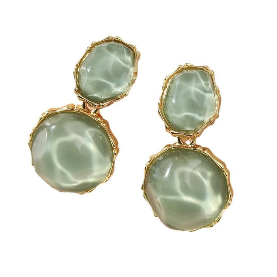 Asymmetric Light Green Creative Water Pattern Irregular Oval Earrings $15.00 Dana Fashion Color: Olive Green Women's Accessories Product information: Treatment Process: Diamond Color: Ivory White, olive green, light yellow, royal blue, pink, rose red, lig